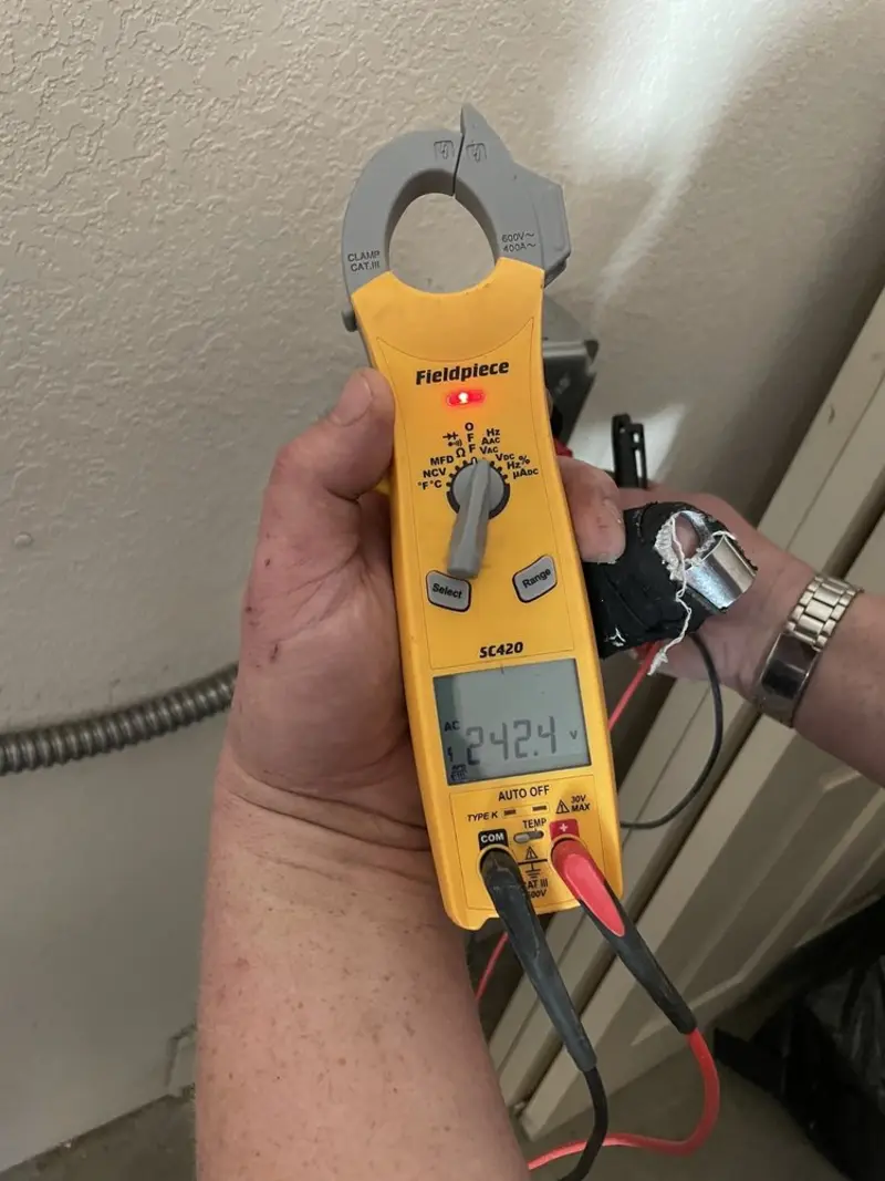Voltage testing with clamp meter during Generator Installation in Sharon
